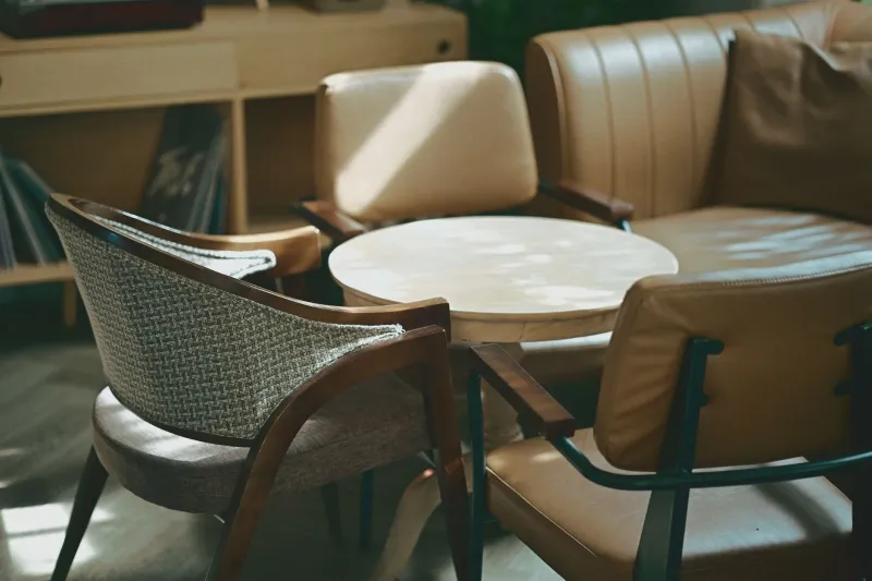 Against Coherence: The American Home's Deliberate Embrace of Furniture That Refuses to Agree